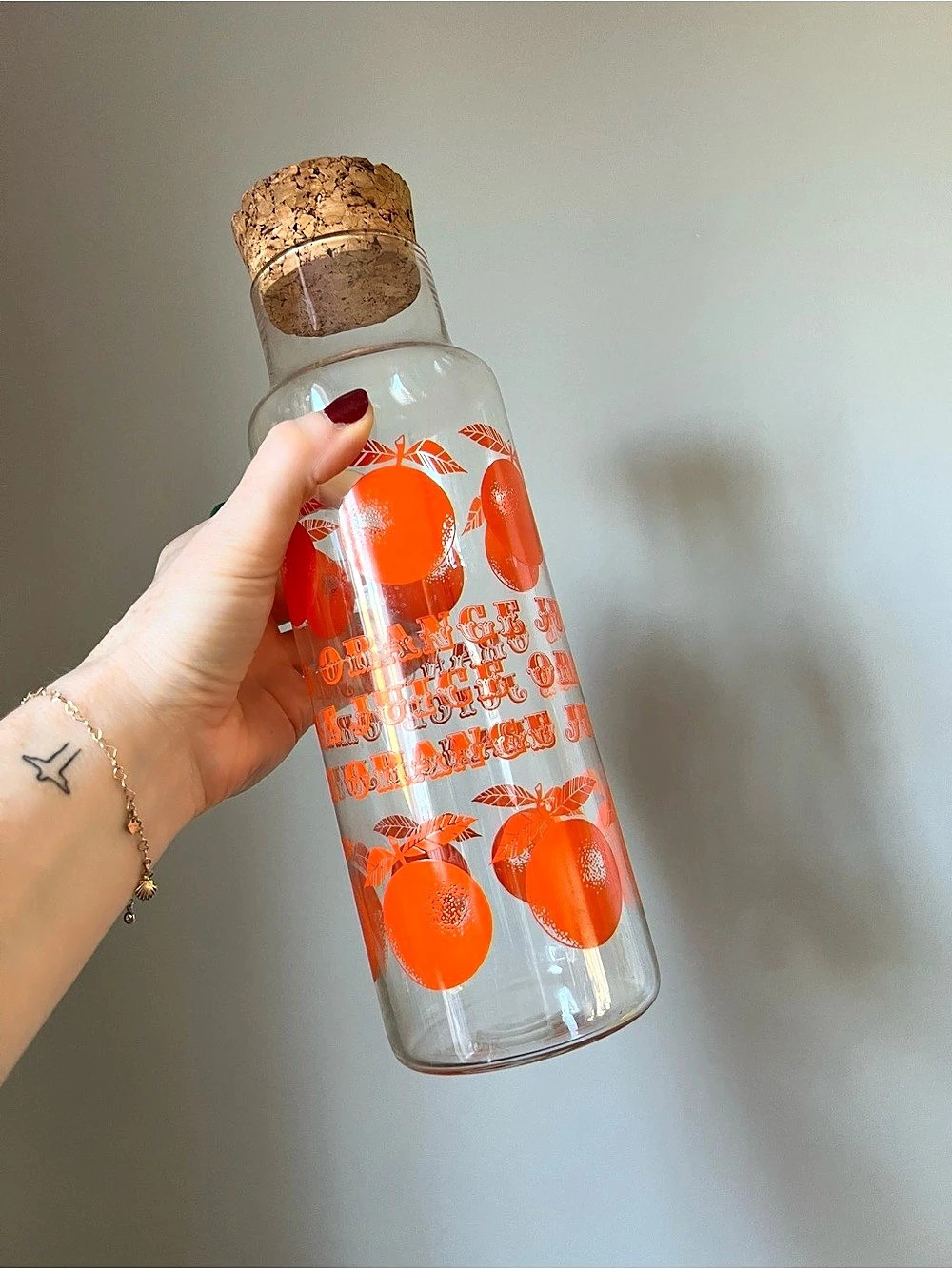 Vintage orange juice jug with cork lid